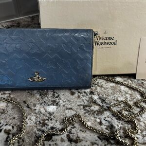 Vivienne Westwood Embossed Blue Crossbody Bag. Comes with 2 chains & box